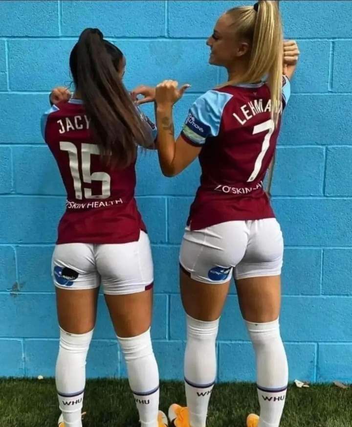 Two soccer player in white shorts