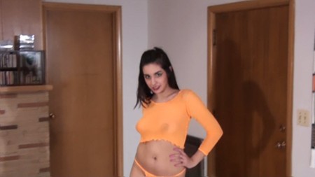 Coed in a sheer bright orange crop top